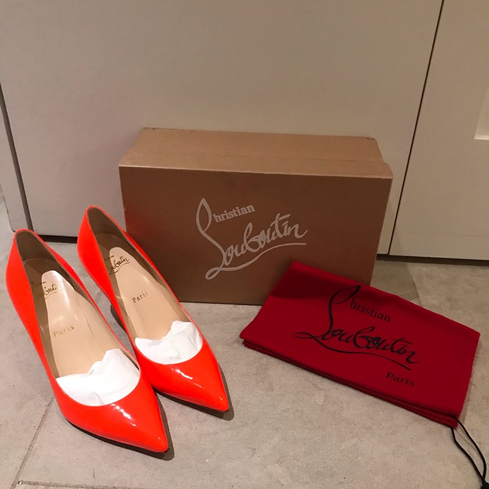 Brand new Christian Louboutin Orange Heels size38